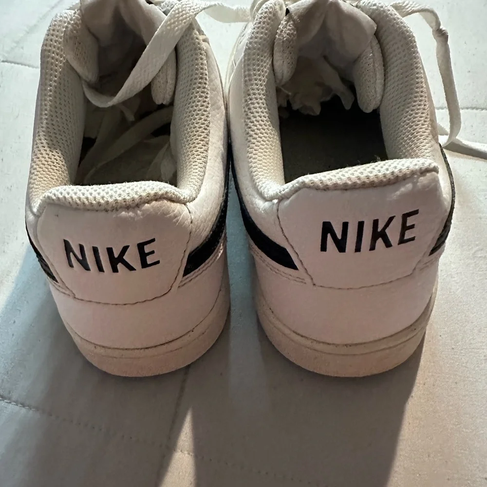 Nike Cream and Black Low-Top Sneakers